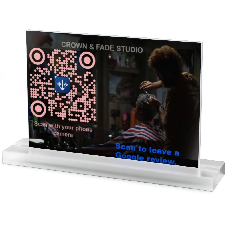 RateInvite QR review sign at Crown & Fade Studio barber shop